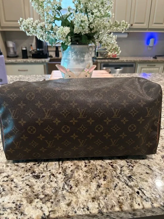 Louis Vuitton Monogram Duffel Bag in Brown and Tan - Picture 2 of 8